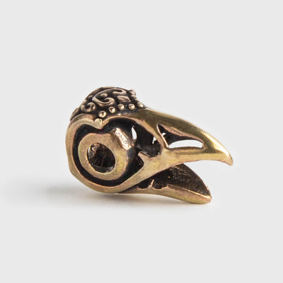 Raven skäggring, brons